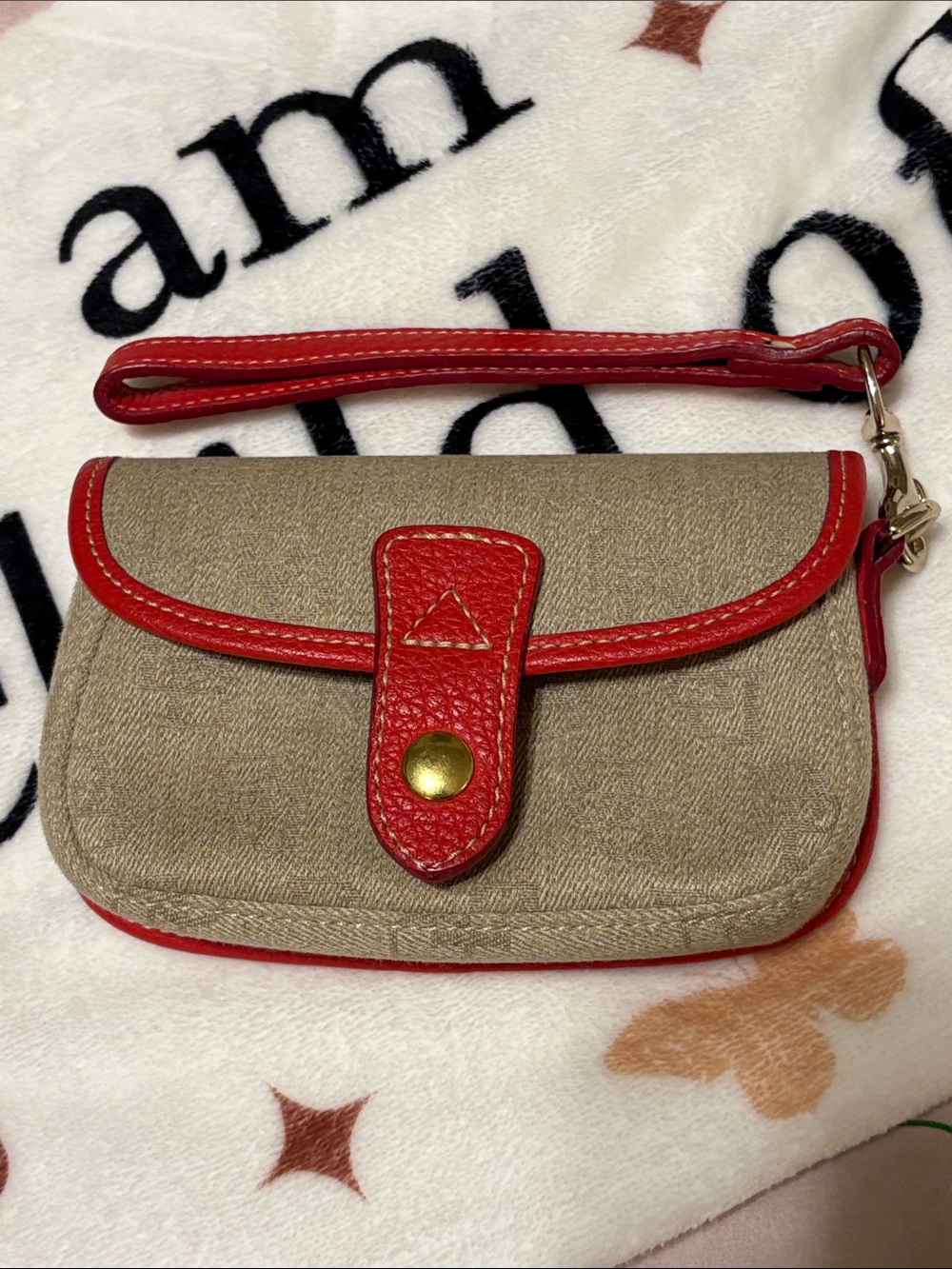 Dooney & Bourke Beige Canvas Wristlet with Red leather Trim - Women's Clutch